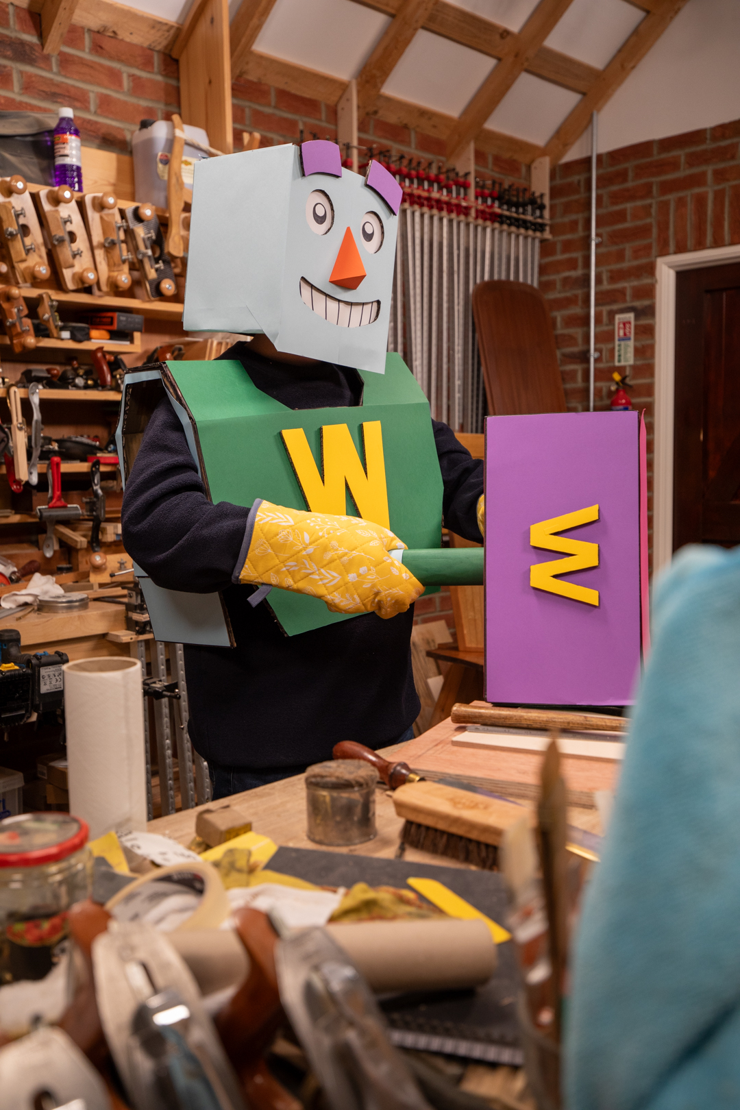 Woody at the workbench, preparing for a dovetail operation